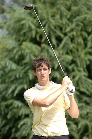 perfect balance - Portrait d'un homme qui joue un coup de golf Photographie de stock - Premium Libres de Droits, Code: 622-00807182