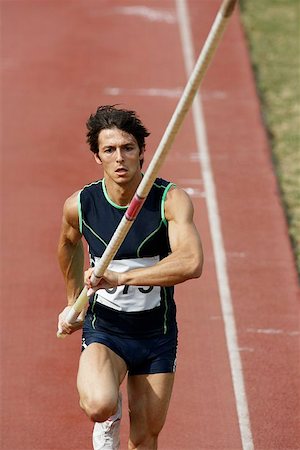 simsearch:622-00947146,k - Male Pole Vaulter Sprinting Down the Track Stock Photo - Premium Royalty-Free, Code: 622-00947142