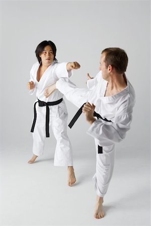 reversing - Two Blackbelts Sparring Stock Photo - Premium Royalty-Free, Code: 622-00947248