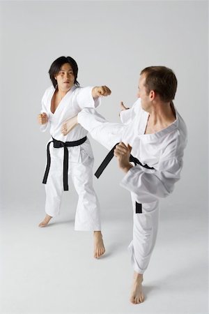 reversal - Two Blackbelts Sparring Stock Photo - Premium Royalty-Free, Code: 622-00947248