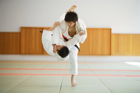 Two Men Competing in a Judo Match Stock Photo - Premium Royalty-Free, Code: 622-00947294