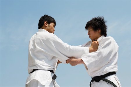 drilling (activity) - Deux hommes en compétition dans un Match de Judo Photographie de stock - Premium Libres de Droits, Code: 622-00947291