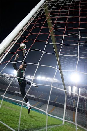 diving (not water) - Goalkeeper Making a Save Foto de stock - Sin royalties Premium, Código: 622-00947406