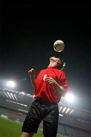 Soccer Player Heading a Ball Stock Photo - Premium Royalty-Free, Code: 622-00947420