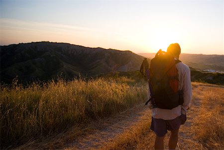 sunrise man back - Backpacker on path Stock Photo - Premium Royalty-Free, Code: 622-01080638