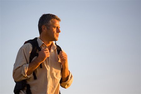 Homme avec sac à dos Photographie de stock - Premium Libres de Droits, Code: 622-01080648