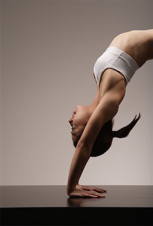 photo japanese yoga girl flexible - Young Asian woman in yoga position Stock Photo - Premium Royalty-Free, Code: 622-01098771