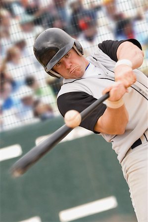 simsearch:622-01283722,k - Baseball player hitting ball Stock Photo - Premium Royalty-Free, Code: 622-01283759