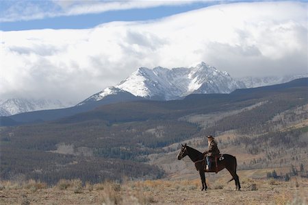 simsearch:622-01572168,k - Cowgirl in the Countryside Foto de stock - Sin royalties Premium, Código: 622-01572179