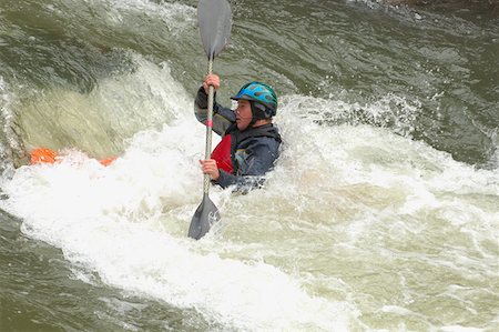 Kayaker Negotiating the River Stock Photo - Premium Royalty-Free, Code: 622-01572214