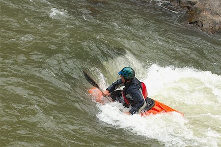 Kayaker Negotiating the River Stock Photo - Premium Royalty-Free, Code: 622-01572215