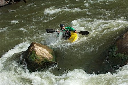 Kayaker Negotiating the River Stock Photo - Premium Royalty-Free, Code: 622-01572224