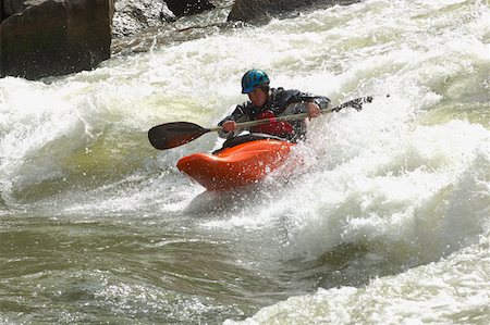 Kayaker Negotiating the River Stock Photo - Premium Royalty-Free, Code: 622-01572238