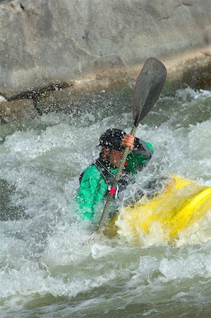 Kayaker Negotiating the River Stock Photo - Premium Royalty-Free, Code: 622-01572241