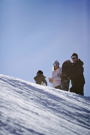 simsearch:622-01695701,k - Three Snowboarders Fotografie stock - Premium Royalty-Free, Codice: 622-01695688