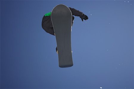 simsearch:622-01695701,k - Snowboarder Flying Through the Air Fotografie stock - Premium Royalty-Free, Codice: 622-01695716