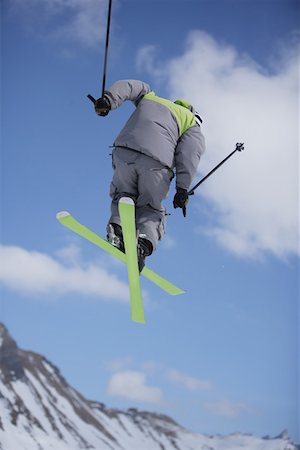 simsearch:622-01695701,k - Skier Flying Through the Air Fotografie stock - Premium Royalty-Free, Codice: 622-01695713
