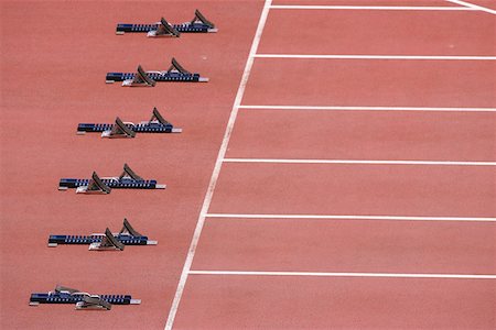 empty track - Track and field starting blocks at starting line Stock Photo - Premium Royalty-Free, Code: 622-01956144