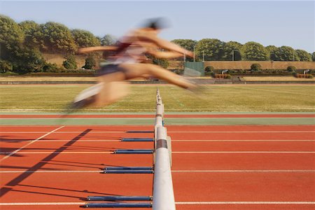 Hurdlers Hurdling Hurdles Stock Photo - Premium Royalty-Free, Code: 622-01956191