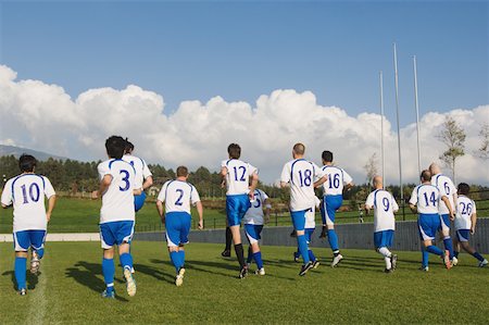 soccer team rear view - Soccer Team Warming Up Stock Photo - Premium Royalty-Free, Code: 622-02198528