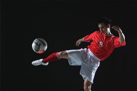 Soccer Player Stock Photo - Premium Royalty-Free, Code: 622-02198609