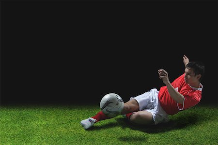 Soccer Player Stock Photo - Premium Royalty-Free, Code: 622-02198616