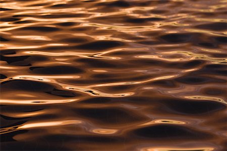 Shimmering water rippples of sea at dusk Stock Photo - Premium Royalty-Free, Code: 622-02354111