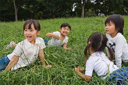 simsearch:622-02354172,k - Girls playing on grass in a park Stock Photo - Premium Royalty-Free, Code: 622-02354261