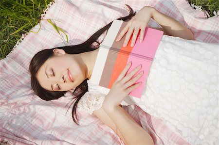 simsearch:640-02953202,k - Young woman sleeping with book Stock Photo - Premium Royalty-Free, Code: 622-02395536