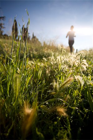 Person jogging in countryside Stock Photo - Premium Royalty-Free, Code: 622-02621560