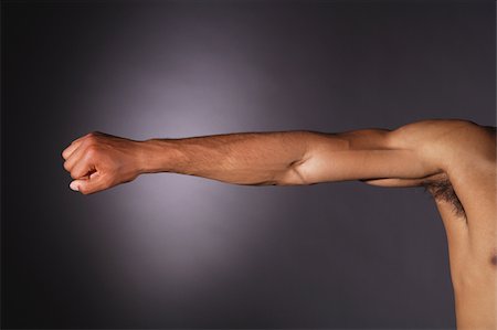 Biceps montrant l'homme Photographie de stock - Premium Libres de Droits, Code: 622-02621673