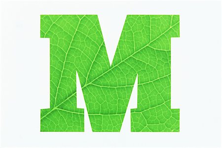 Green Alphabet M on White Background Stock Photo - Premium Royalty-Free, Code: 622-02757699