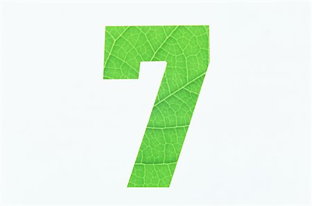 Green Number 7 on White Background Stock Photo - Premium Royalty-Free, Code: 622-02757719