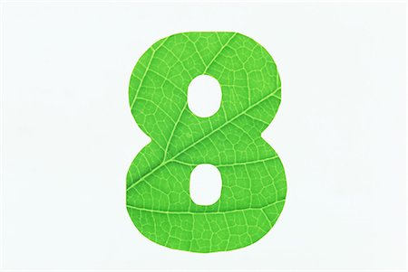Green Number 8 on White Background Stock Photo - Premium Royalty-Free, Code: 622-02757720