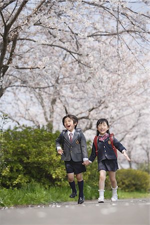 schoolgirls walking - Schoolmate going to school Stock Photo - Premium Royalty-Free, Code: 622-02758489