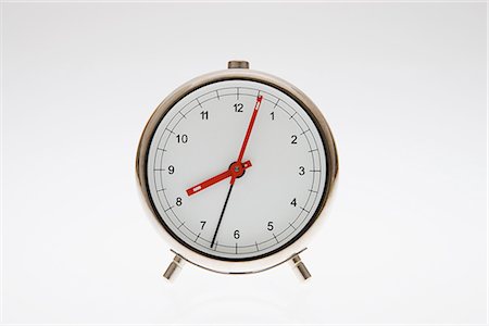 Alarm Clock on White Background Stock Photo - Premium Royalty-Free, Code: 622-02758788