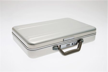 Briefcase on White Background Foto de stock - Royalty Free Premium, Número: 622-02758837