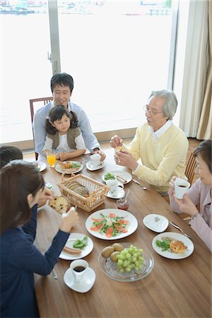 elderly woman caring family - Asian family having breakfast together Stock Photo - Premium Royalty-Free, Code: 622-02759166