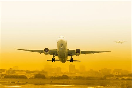 Jumbo Jet Taking Off From the Runway at International Airport Stock Photo - Premium Royalty-Free, Code: 622-02759526