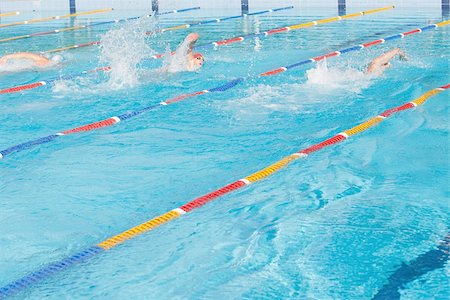 simsearch:622-02913244,k - Three australian  swimmers competing Fotografie stock - Premium Royalty-Free, Codice: 622-02913243