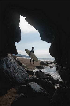 simsearch:622-02913397,k - Surfeur sur la plage avec sa planche de surf Photographie de stock - Premium Libres de Droits, Code: 622-02913408