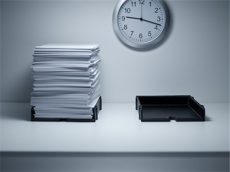 Piles Of Paper On Desk Stock Photos Page 1 Masterfile