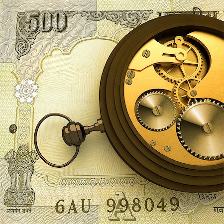 réveils - Pocket watch on Indian five hundred rupee note Photographie de stock - Premium Libres de Droits, Code: 630-06724418