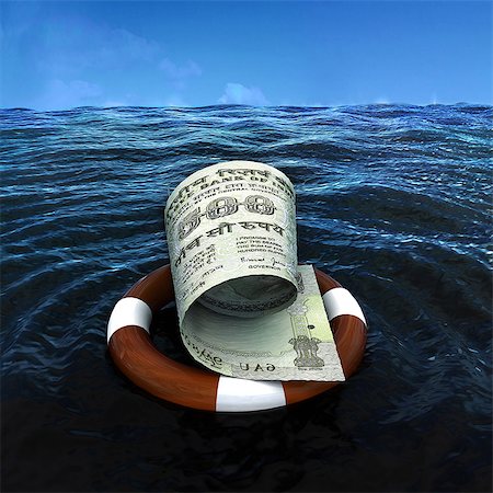 simsearch:630-06724088,k - Indian five hundred rupee note on life preserver tube in the sea Stock Photo - Premium Royalty-Free, Code: 630-06724426