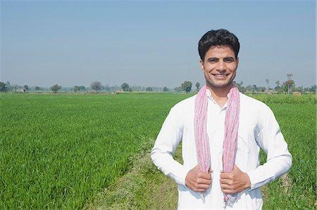 fields and village - Farmer standing in the field, Sonipat, Haryana, India Stock Photo - Premium Royalty-Free, Code: 630-06724654
