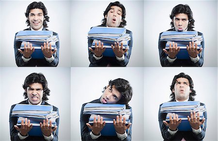 responsible man - Multiple images of a businessman carrying stack of files making different faces Stock Photo - Premium Royalty-Free, Code: 630-06724740