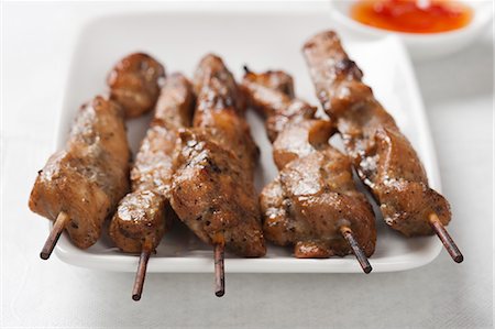 skewered meat - Close-up of kebab Foto de stock - Sin royalties Premium, Código: 630-06724866