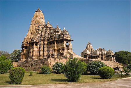 Low angle view of a temple, Kandariya Mahadeva Temple, Khajuraho, Chhatarpur District, Madhya Pradesh, India Stock Photo - Premium Royalty-Free, Code: 630-06721834
