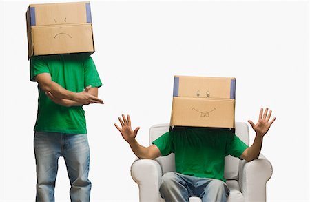 simsearch:6108-05868494,k - Multiple images of a man covering his face in cardboard boxes Foto de stock - Sin royalties Premium, Código: 630-06721852