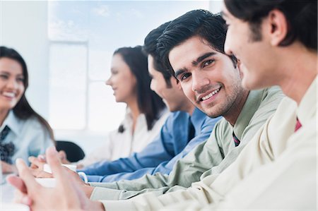 simsearch:630-06722386,k - Business executives in a meeting Stock Photo - Premium Royalty-Free, Code: 630-06722378